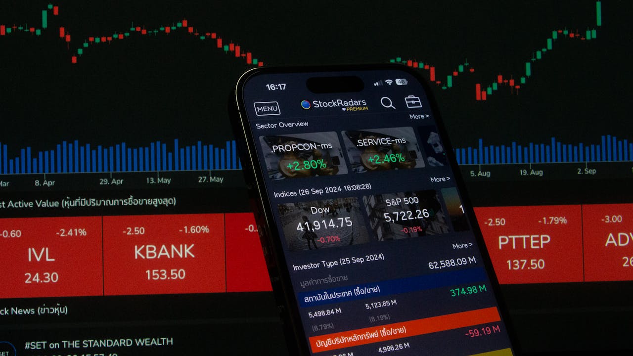 journey Close-up of a digital stock trading app interface with investment charts and market trends displayed.
